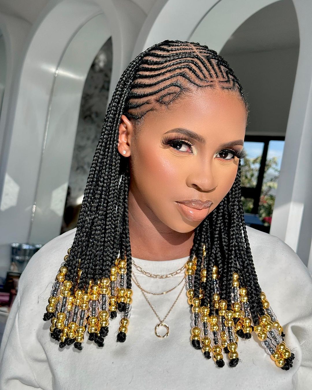 10. Tiny Fulani Braids with Beads