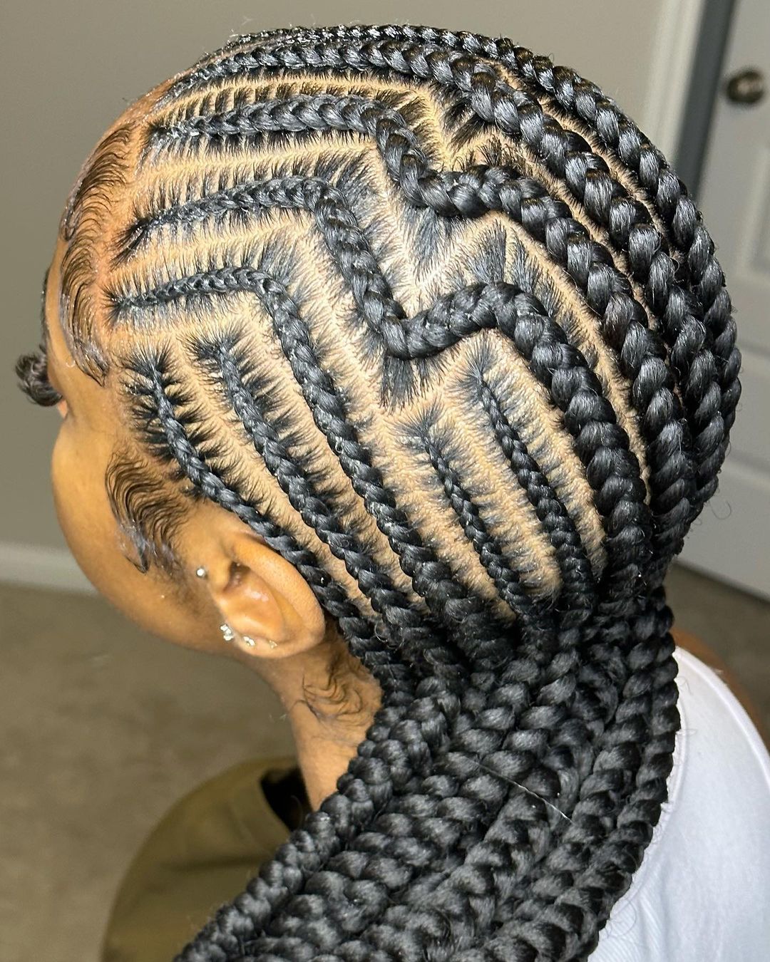 17. Sectioned Medium Tribal Cornrow Braids