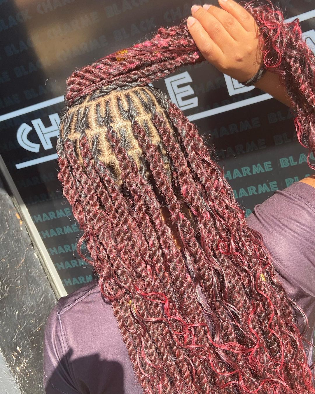 2. Burgundy Tribal Braids and Twists