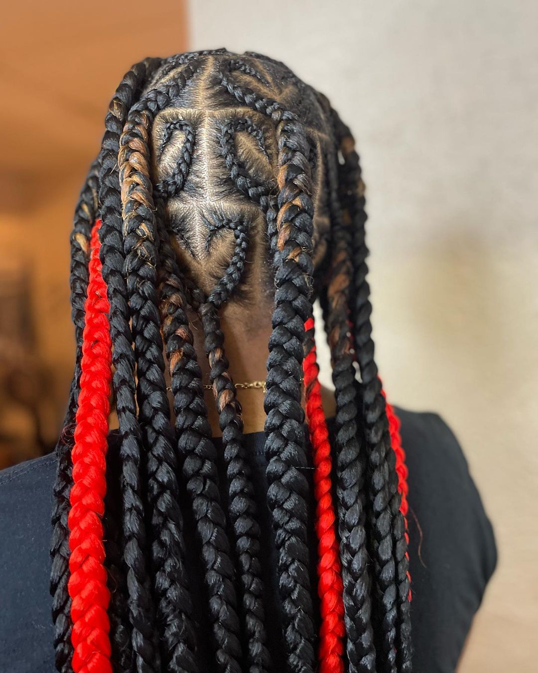 19. Jumbo Black And Red Knotless Braids With Heart Design