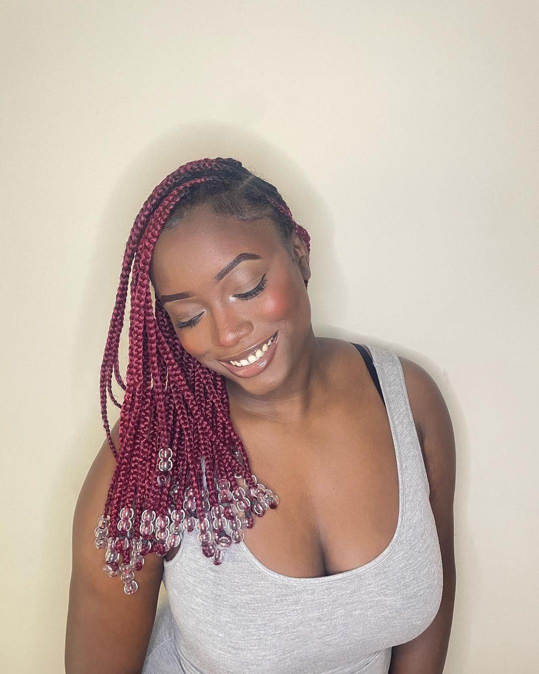21. Short Burgundy Knotless Braids With Water Beads