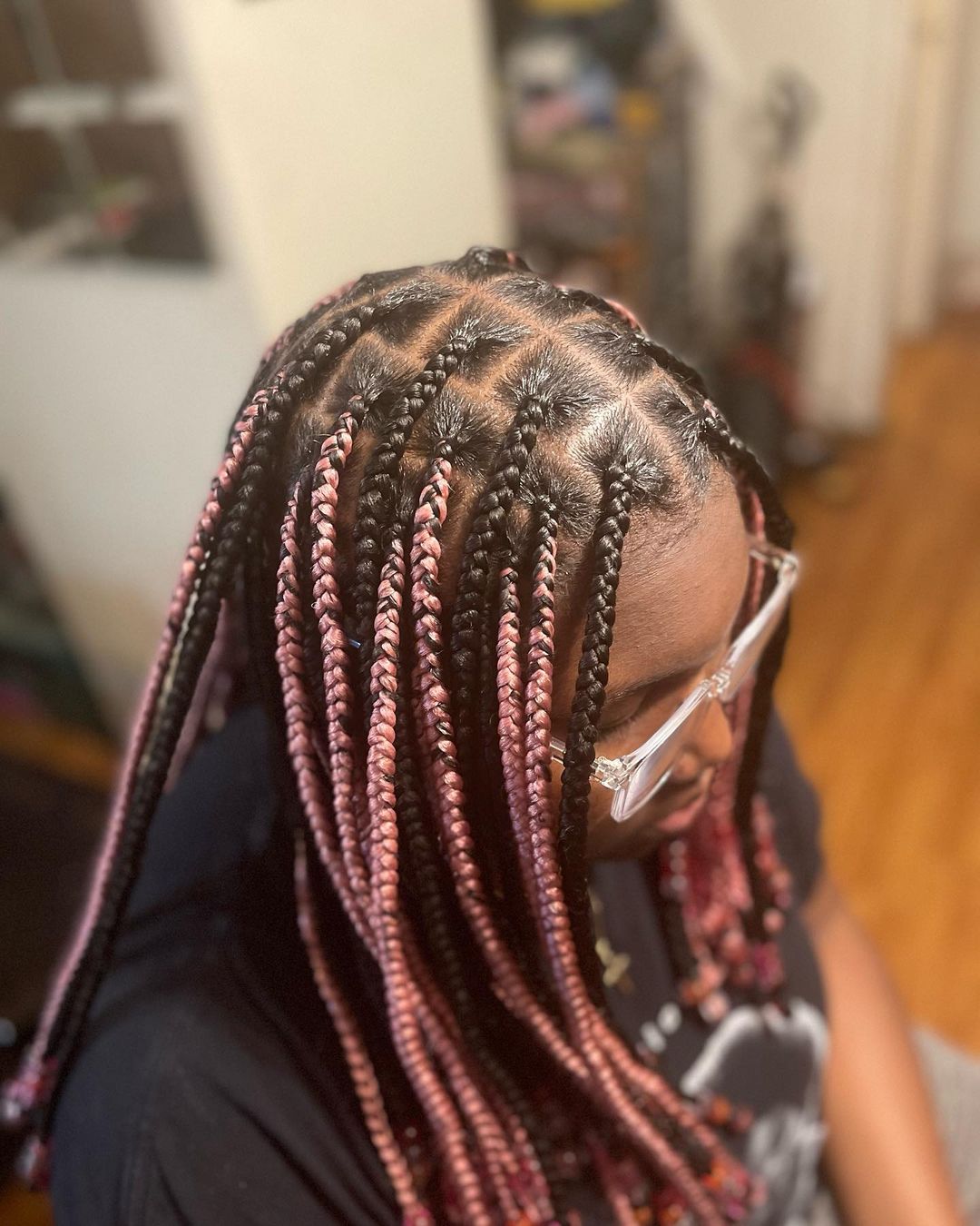 28. Center Part Black And Pink Knotless Braids With Colorful Beads
