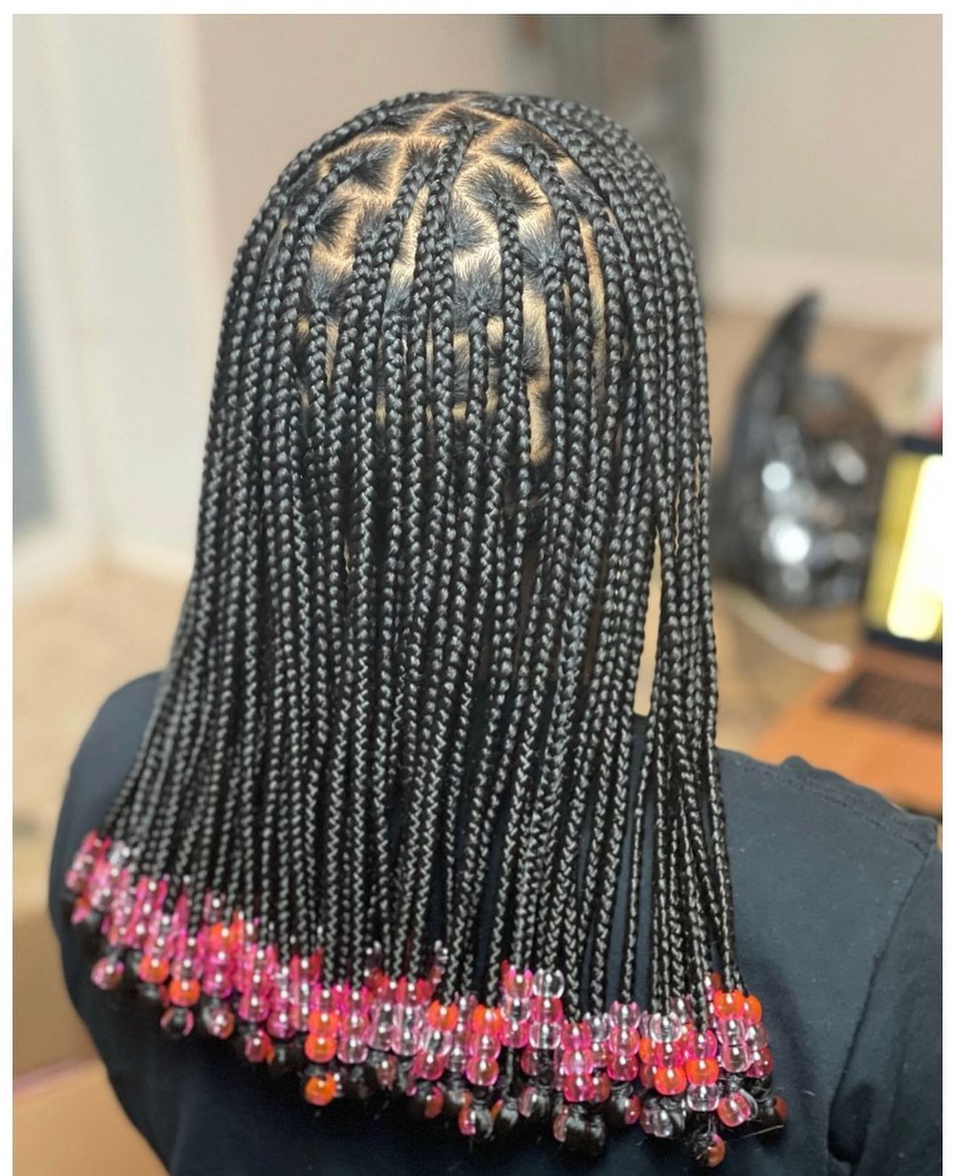 43. Black Classy Knotless Braids With Red Transparent Beads