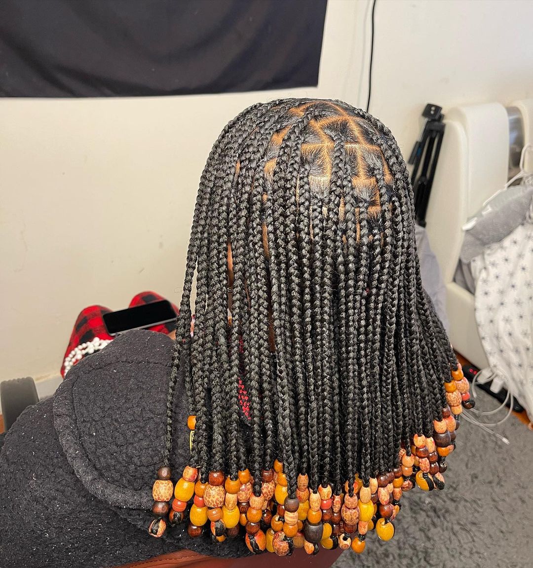 34. Shoulder Length Full Black Knotless Braids With Yellow Cultural Beads