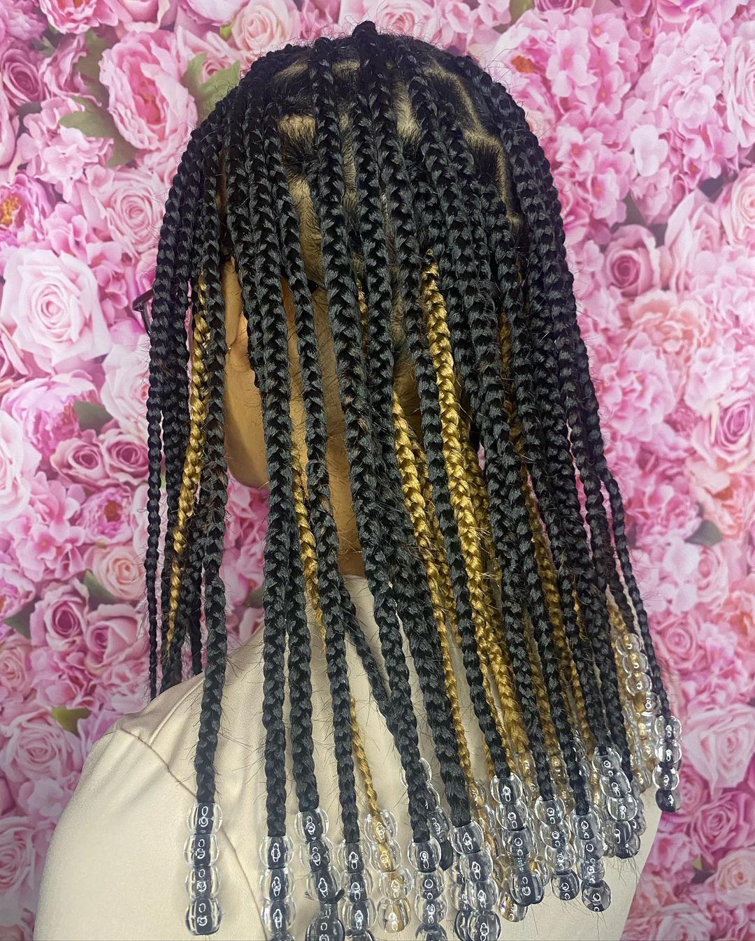 25. Black And Gold shoulder-length knotless Braids With Water Beads