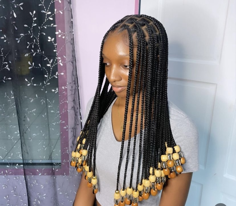 9. Short Knotless Braids with Wooden Beads