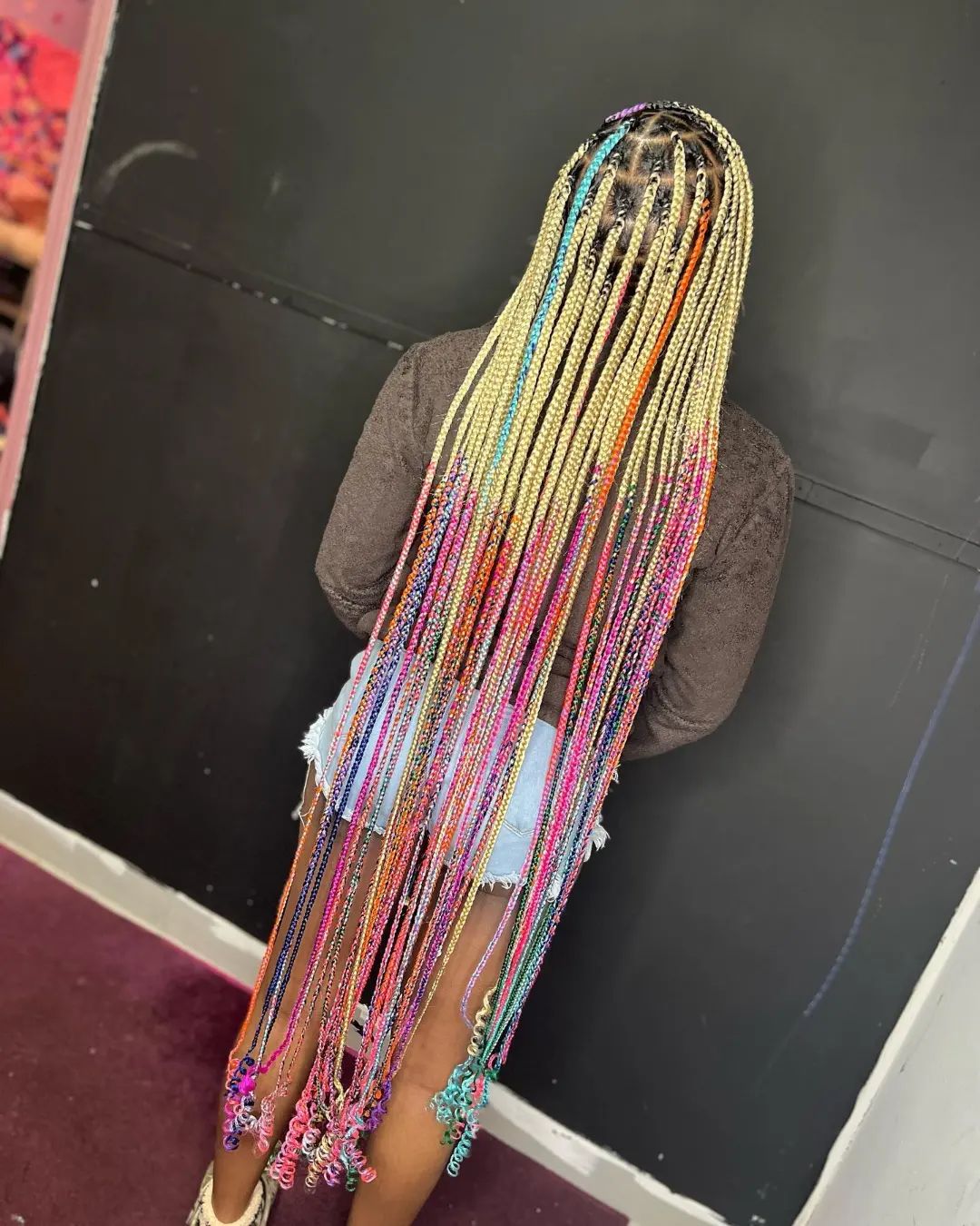 43. Lengthy Knotless Braids of Many Colors