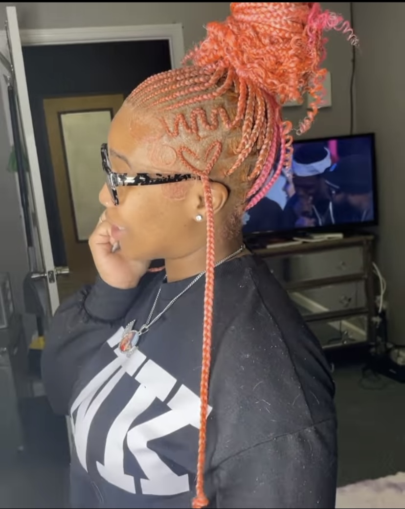 10. Multiple Patterned Cornrow with Knotless Braids 