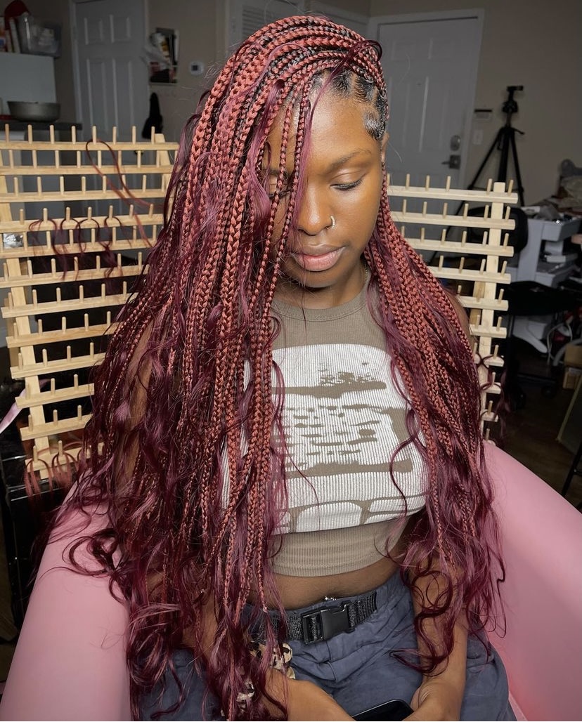 40. Knotless Braids with Human Hair Curls