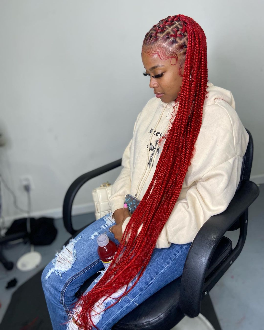 1. Red Boho Criss Cross Knotless Braids