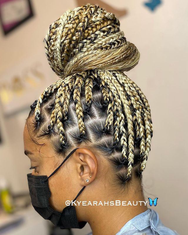 4. Golden Blonde Knotless Braids Bun