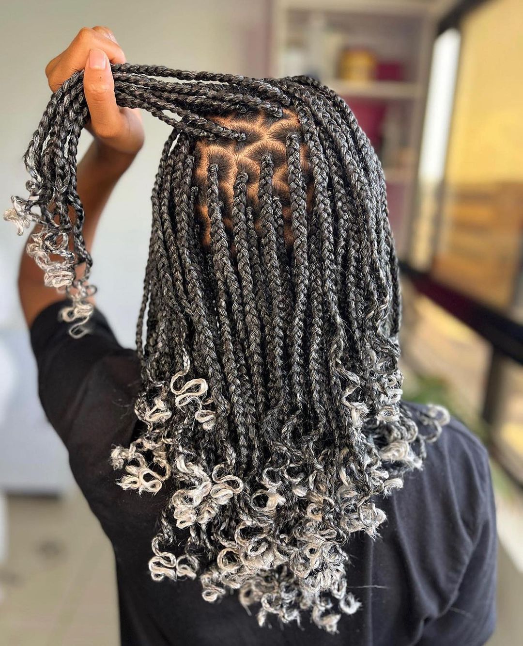 14. White and Black Mix Bohemian Knotless Braids With Curly Ends