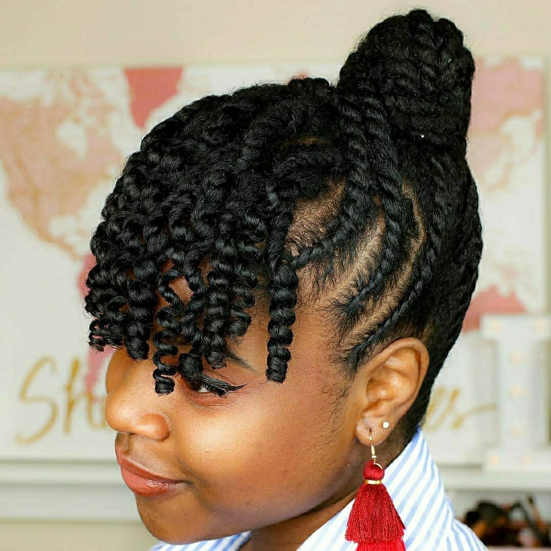 28. Weaves in an Updo With Twist Out Fringes