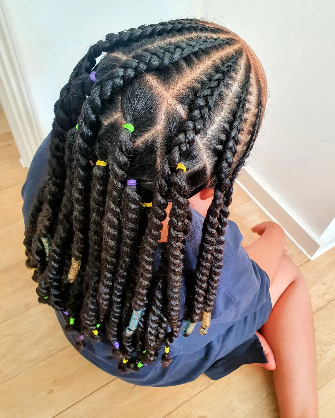 19. Medium Cornrows on Individual Twists With Colorful Bands