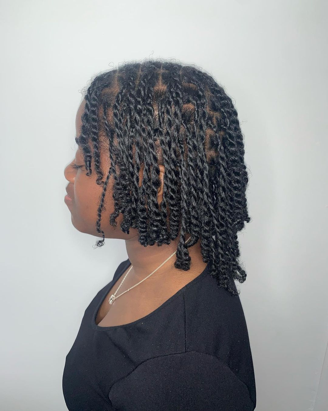 11. Medium Two Strand Short Twists On Natural Hair With Curly Ends
