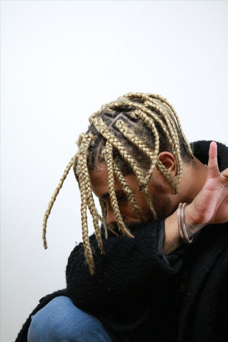 6. Box Braids with Blonde Extensions