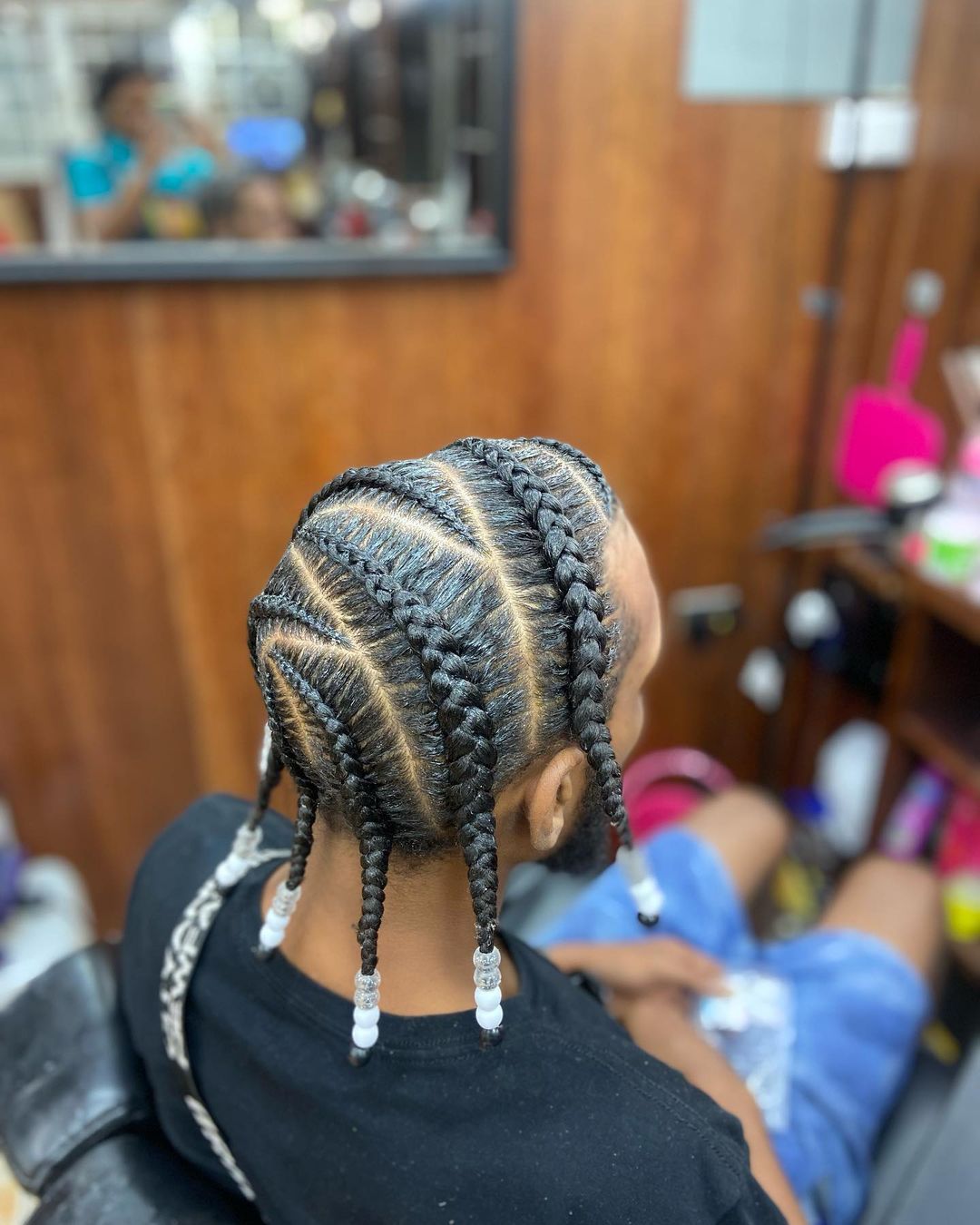 26. Bold Zig Zag Parted Braids With Water Beads